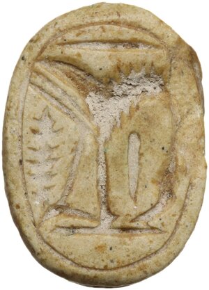 reverse: Egyptian world. Limestone scarab with phytomorph decoration on the flat side. 23x16.5 mm