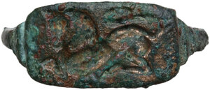 reverse: Italic, probably 7th century BC. Bronze ring with an orientalizing engraving of a lion.  24 mm., 19 mm. inner size