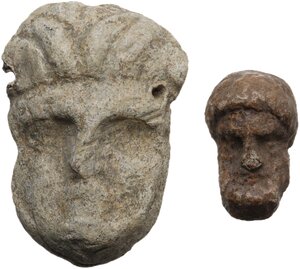 obverse: Greek world. Lot of two (2) lead decorative elements in the shape of bearded faces.35x24 mm. and 20x12 mm