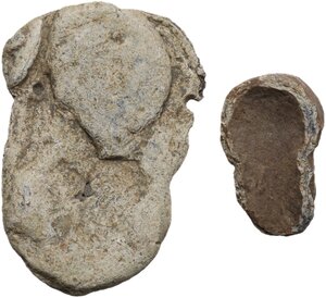 reverse: Greek world. Lot of two (2) lead decorative elements in the shape of bearded faces.35x24 mm. and 20x12 mm