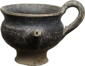 obverse: Greek world. Southern Italy. 4th-2nd century BC. Small black-glazed pottery guttus. 57 mm. max. height, 56 mm. bowl width