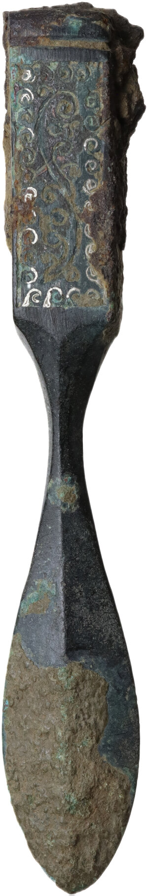 obverse: Late Roman period, Balkans. Bronze tool. Handle elaborately decorated with floral patterns, some silvering in the lines of the pattern.  78 mm