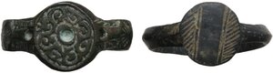 obverse: Late Roman to Migration period. Lot of 2 bronze seal rings, the bezel decorated with engraved geometric patterns.  Inner diameters: 18 mm and 19 mm