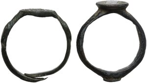 reverse: Late Roman to Migration period. Lot of 2 bronze seal rings, the bezel decorated with engraved geometric patterns.  Inner diameters: 18 mm and 19 mm