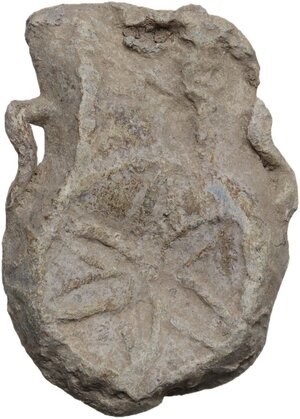 obverse: Medieval period. Lead pilgrim s ampulla.41 x 28 mm