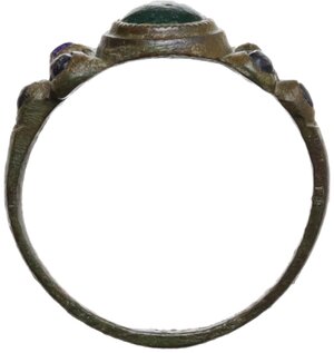 obverse: Medieval or Renaissance period. Bronze ring with circular green stone in the center and three small blue glass pastes on each side.   19 mm