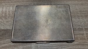 obverse: Portasigarette in argento 0.925 con fascetto sul punzone. Ag (160 g - 123x84 mm). Buono stato