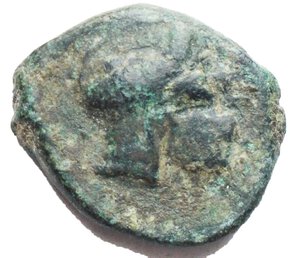 reverse: Mondo Greco - Sicily. Entella. Hexas (?), ca 345-338 BC. Obv. Horse galloping right. Rev. Helmet right. Calciati I, p.320,14 OS. Campana 12. AE. g 4.7 - mm 18,9. Rare. Good VF. Rare. Green patina