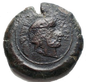 obverse: Mondo Greco - Sicily, the Tyrrhenoi  Litra. Circa 354/3-336 BC. Overstruck on a Syracuse Drachm. Helmeted head of Athena right; TYPPH before / Athena standing facing, holding spear in right hand and resting hand on grounded shield to right. 29.26 g, 31,4 mm Near Very Fine; dark green patina. Extremely Rare and interesting.