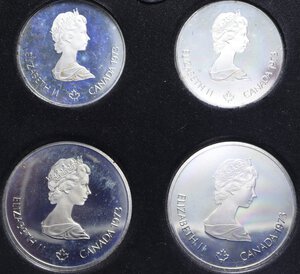 obverse: CANADA 10+10+5+5 DOLLARI 1976 MONTREAL AG. 48,6+48,6+24,3+24,3 GR. IN COFANETTO PROOF