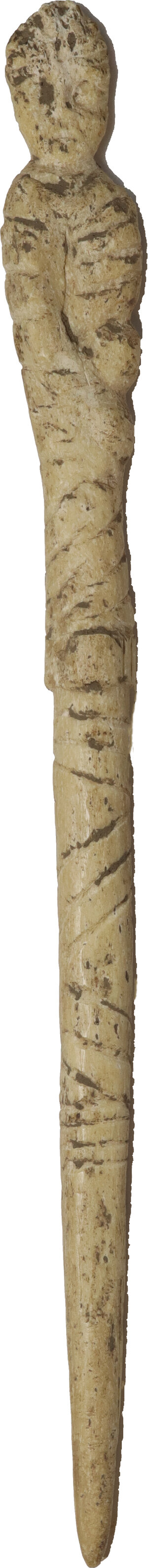 obverse: BONE DRESS NEEDLE  Roman period, c. 3rd century AD.  Fascinating large Roman dress needle made of engraved bone and configured as a female figure. The accessory decoration consists of a series of oblique incised lines.  Lenght: 170 mm