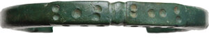 obverse: ROMAN BRONZE BRACELET  Roman period, c. 3rd to 5th century AD.  Bronze bracelet decorated with punched dots.  Diameter: 54 mm. Width: 7 mm
