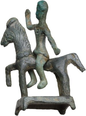 obverse: EQUESTRIAN STATUETTE GROUP  Roman period, Balkans, c. 3rd-4th century AD.  Bronze group composed of two elements, a horseman and his horse. The stylistic rendering of the anatomical details of the horse are accurate. Movement is rendered by the right front leg raised, simulating the animal s gallop. The horseman holds his right arm raised and his left outstretched, as if holding weapons.  Horse: 62x48x24 mm. Rider: 51x31 mm
