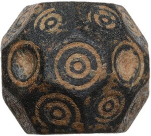reverse: ROMAN BRONZE DICE  Roman period, c. 1st-3rd century AD.  Roman bronze game dice with numerous faces.  Diameter: 18 mm