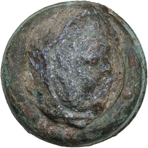 obverse: ROMAN BRONZE BULLA  Roman period, c. 1st-3rd century AD.  Interesting Roman bronze bulla, probably pertaining to the decoration of a piece of furniture, depicting a portrait turned to the right.   Diameter: 37 mm
