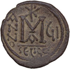 reverse: Heraclius, with Heraclius Constantine (610-641).. AE Follis. Seleucia Isauriae mint, 1st officina. Dated RY 7 (616/7)