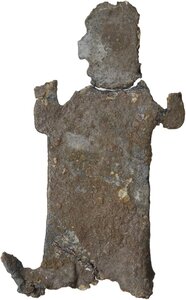 reverse: VOTIVE LEAD PLATE  Probably Roman republican period, c. 3rd-1st century BC.  Lead plaque depicting a bearded figure in a long robe, probably leaning on a stick.  Dimensions: 59x32 mm