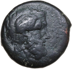 obverse: Petra. AE Litra, c. 354-344 BC, overstruck on Syracusan bronze (Athena/Dolphins, dated c. 375-344 BC)