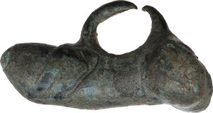 obverse: ROMAN PHALLIC AMULET  Roman period, c. 1st-2nd century AD.  Cast bronze pendant in the form of male genitals with realistic rendered details, surmounted by a suspension loop.  Lenght: 29 mm