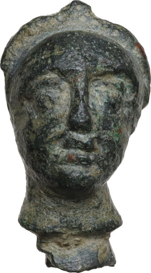 obverse: BRONZE HEAD OF A FEMALE STATUETTE  Roman period, c. 3rd - 4th century AD.  Head of a female statuette, diademed and with complex hairstyle gathered in a bun at the back of the head.  Height: 31.50 mm. Weight: 27.12 g