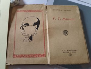 reverse: Futurismo- Libricino di Pavolini su Marinetti contenente xilografia di Prampolini con caricatura di Marinetti
