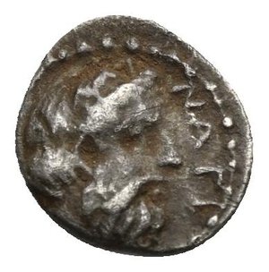 reverse: CILICIA. Nagidos. Circa 400-380 BC. Obol (Silver, 10.45 mm, 0.72 g). Bearded head of Pan to right. Rev. NAΓI Bearded head of Dionysos to right. SNG Levante 4-5. SNG Paris 16-18. Reverse and obverse struck off-centre. Toned, with deposits. About Very Fine.