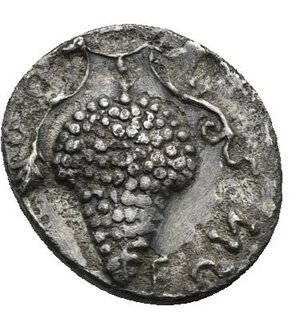 reverse: CILICIA. Soloi. Circa 350-300 BC. Obol (Silver, 8.30 mm, 0.66 g). Head of Athena to right, wearing Corinthian helmet . Rev.  [ΣΟΛ]ΕΩΝ Large bunch of grapes with tendrils and a leaf. SNG France 2, Cilicie, 184. SNG Switzerland I, Levante-Cilicia, --. SNG von Aulock 5872 var. Toned. Some deposits and corrosion, otherwise, Good Very Fine.   