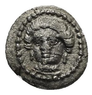 obverse: CILICIA. Tarsos. Time of Pharnabazos and Datames. Circa 380-360 BC. Obol (Silver, 10.15 mm, 0.86 g). Female head facing slightly left; wearing pendant earrings and a pearl necklace. Rev. Helmeted and bearded male head to right. SNG France 2, Cilicie, 309. SNG Switzerland I, Levante-Cilicia, 91-92. Toned. Lightly double struck on reverse, otherwise,  Very Fine.  
