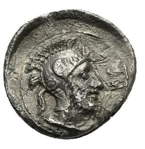 reverse: CILICIA. Tarsos. Time of Pharnabazos and Datames. Circa 380-360 BC. Obol (Silver, 10.15 mm, 0.86 g). Female head facing slightly left; wearing pendant earrings and a pearl necklace. Rev. Helmeted and bearded male head to right. SNG France 2, Cilicie, 309. SNG Switzerland I, Levante-Cilicia, 91-92. Toned. Lightly double struck on reverse, otherwise,  Very Fine.  