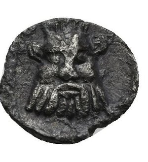 reverse: CILICIA. Uncertain mint. Circa 400-350 BC. Obol (Silver, 10.40 mm, 0.62 g). Head of female facing (Aphrodite?), turned slighty to left, wearing pendant earrings and a pearl necklace. Rev. Facing head of Bes. SNG Switzerland I, Levante-Cilicia, 233. SNG France 2, Cilicie, 486. Dark patina. Surface porosity and deposits, otherwise, Very Fine.    