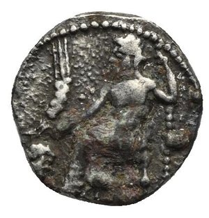obverse: CILICIA. Uncertain mint. Circa 400-300 BC. Obol (Silver, 11.45 mm, 0.78 g) Baaltars seated left on throne, holding grain ear and grape bunch below (not clear) in the right hand and scepter in the left hand. Rev. Eagle standing left with open wings on plow, all within dotted square. Gokturk 41; SNG Levante 228; SNG France 459-61. Toned. Granular surface of obverse, otherwise, Nearly Very Fine.

