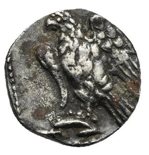 reverse: CILICIA. Uncertain mint. Circa 400-300 BC. Obol (Silver, 11.45 mm, 0.78 g) Baaltars seated left on throne, holding grain ear and grape bunch below (not clear) in the right hand and scepter in the left hand. Rev. Eagle standing left with open wings on plow, all within dotted square. Gokturk 41; SNG Levante 228; SNG France 459-61. Toned. Granular surface of obverse, otherwise, Nearly Very Fine.

