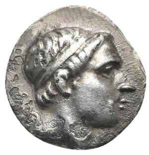 obverse: SELEUKID KINGS OF SYRIA. Antiochos III  the Great , 223-187 BC. Drachm (Silver, 17.20 mm, 3.85 g). Apameia on the Orontes (?), circa 212 BC. Diademed head of Antiochos III to right. Rev. ΒΑΣΙΛΕΩΣ / ΑΝΤΙΟΧΟΥ Elephant standing right; in the right field, monogram. Seleucid Coins I, 404-405, 1065.6. HGC 9, 453a. SNG Israel I, Coll. Spaer, 693. Metal fault on obverse, otherwise, Very Fine.
From a European collection formed prior to 2005.