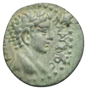 obverse: SYRIA. Uncertain Caesarea.  Claudius, 41-54.  (Bronze, 20.81 mm, 4.99 g). Dated RY 3 (43/4[?]).  ΚΛΑΥ[ΔΙ]ΟϹ Κ[ΑΙϹΑΡ] Laureate head of Claudius right. Rev.  ƐΤΟΥϹ ΚΑΙϹΑΡƐΩΝ Γ Veiled head of Tyche right, wearing mural crown; Γ (date) to left. RPC I 4084; SNG Von Aulock 6348 (Caesarea in Cappadocia); SNG Copenhagen 177 (Caesarea in Cappadocia). Obverse struck off-centre. Beautiful green patina. About Extremely Fine. 