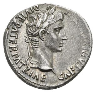 obverse: Augustus, 27 BC-14 AD. Denarius (Silver, 19.70 mm, 3.83 g). Lugdunum mint. 2 BC-4 AD. CAESAR [AVGVSTVS] DIVI F PATER PATRIAE laureate head to right. Rov. [AVGVSTI F COS DESIG PRINC] IVVENT Gaius and Lucius Caesars standing facing, two shields and two spears between them; lituus and simpulum above; CL CAESARE[S] in exergue. RIC I, 210. BMCRE 540. RSC 43c. Struck in high relief and beautifully toned, slightly off center on reverse, otherwise, Extremely Fine.