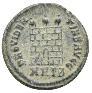 reverse: Constantinus I, 306-337. Follis (Bronze, 19.91 mm, 3.18 g) Heraclea, 317. IMP CONSTANTINVS AVG Laureate, draped and cuirassed bust left, holding mappa in the right hand and globe with scepter on the left shoulder. Rev. PROVIDEN TIAE AVGG Camp gate with six layers, three turrets and no door, MHTB in exergue. RIC VII, 16; Cohen 459. Nearly Very Fine. 

