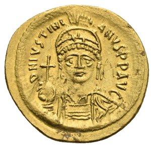 obverse: Justinian I, 527-565. Solidus (Gold, 21,88 mm, 4,48 g), Constantinopolis, 545-565. D N IVSTINIANVS P P AVI Helmeted and cuirassed bust of Justinian facing, holding globus cruciger in his right hand and shield, decorated with cavalryman riding over fallen enemy, in his left. Rev. VICTORIA AVGGG S / CONOB Angel standing facing, holding long linear staff surmounted by staurogram in his right hand and globus cruciger in his left; in field to right, star. DOC 9; MIB 7, SB 140. Some roughness and deposits, otherwise, Good Extremely Fine.