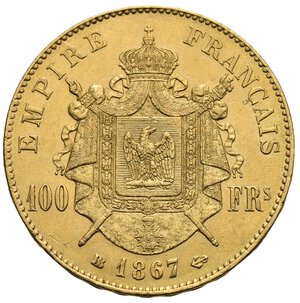 reverse: FRANCE. Napoleon III, 1852-1870. 100 Francs 1867 BB (Gold, 35 mm, 32.25 g) Strasbourg. NAPOLEON III EMPEREUR. Laureated head of Napoleon III to right. BARRE in exergue. Rev. EMPIRE FRANÇAIS 100 FRs. Ecu decorated with an eagle on a beam surrounded by the collar of the Legion of Honor; BB 1867 anchor in exergue. Gadoury 1136; Friedberg 551. Extremely Fine. Mintage 2807.