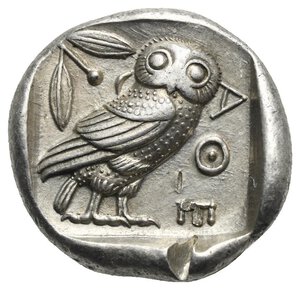 reverse: ATTICA. Athens. Circa 465/2-454 BC. Tetradrachm (Silver, 23.60, 14.29 g) Head of Athena right, wearing crested Attic helmet, decorated with palmette, and earring. Rev. AΘE vertical to right. Owl with closed wings standing right, head facing; olive branch to left and crescent, all within incuse square. Kroll 8; HGC 4, 1596; Starr pl. XXII, 1-3; Kraay & Hirmer 360-1. Attractive late 
