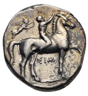 obverse: CALABRIA. Tarentum. Circa 330-325 BC. Nomos or didrachm (Silver, 20.0 mm, 7.73 g), struck under the magistrates Sim... and Her... Naked ephebus seated on horse to right, wreathed by Nike flying behind him; below, ΣΙΜ. Rev. [ΤΑΡΑΣ] Taras riding dolphin to left, holding a kantharos in his right hand and a trident with his left; below, ⊢ΗΡ above waves. Fischer-Bossert 777 (V306/R603). Vlasto 504. HN Italy 886. HGC 1, 784. SNG ANS 958. Light encrustation and deposits, otherwise, Good Very Fine. 