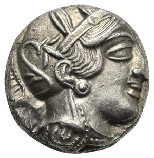 obverse: ATTICA. Athens. Circa 454-404 BC. Tetradrachm (Silver, 24.71 mm, 17.16 g) Head of Athena right, wearing crested Attic helmet, decorated with palmette, and earring. Rev. AΘE vertical to right. Owl with closed wings standing right, head facing; olive branch to left and crescent, all within incuse square. Kroll 8; HGC 4, 1597. Nearly Extremely Fine. 

