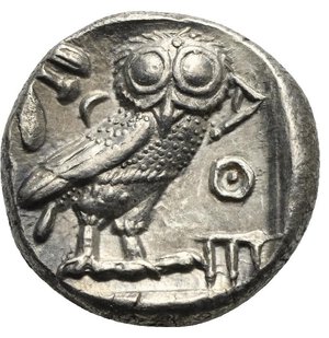 reverse: ATTICA. Athens. Circa 454-404 BC. Tetradrachm (Silver, 24.71 mm, 17.16 g) Head of Athena right, wearing crested Attic helmet, decorated with palmette, and earring. Rev. AΘE vertical to right. Owl with closed wings standing right, head facing; olive branch to left and crescent, all within incuse square. Kroll 8; HGC 4, 1597. Nearly Extremely Fine. 

