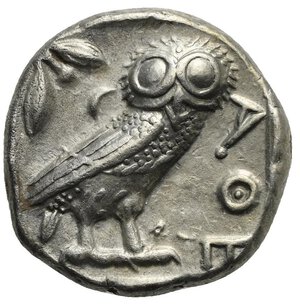 reverse: ATTICA. Athens. Circa 454-404 BC. Tetradrachm (Silver, 23.90 mm, 17.09 g) Head of Athena right, wearing crested Attic helmet, decorated with palmette, and earring. Rev. AΘE vertical to right. Owl with closed wings standing right, head facing; olive branch to left and crescent, all within incuse square. Kroll 8; HGC 4, 1597. Good Very Fine.
From a European collection formed prior to 2005.

