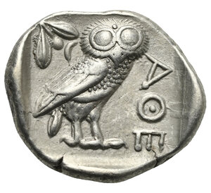 reverse: ATTICA. Athens. Circa 454-404 BC. Tetradrachm (Silver, 27.90 mm, 17.07 g) Head of Athena right, wearing crested Attic helmet, decorated with palmette, and earring. Rev. AΘE vertical to right. Owl with closed wings standing right, head facing; olive branch to left and crescent, all within incuse square. Kroll 8; HGC 4, 1597. Minor flan crack, otherwise, Extremely Fine. 

