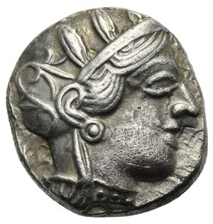 obverse: ATTICA. Athens. Circa 454-404 BC. Tetradrachm (Silver, 23.95 mm, 17.10 g) Head of Athena right, wearing crested Attic helmet, decorated with palmette, and earring. Rev. AΘE vertical to right. Owl with closed wings standing right, head facing; olive branch to left and crescent, all within incuse square. Kroll 8; HGC 4, 1597. Minor porosity on obverse, otherwise, Very Fine/Extremely Fine. 


