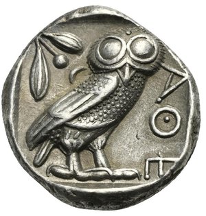 reverse: ATTICA. Athens. Circa 454-404 BC. Tetradrachm (Silver, 23.95 mm, 17.10 g) Head of Athena right, wearing crested Attic helmet, decorated with palmette, and earring. Rev. AΘE vertical to right. Owl with closed wings standing right, head facing; olive branch to left and crescent, all within incuse square. Kroll 8; HGC 4, 1597. Minor porosity on obverse, otherwise, Very Fine/Extremely Fine. 

