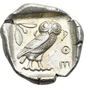 reverse: ATTICA. Athens. Circa 454-404 BC. Tetradrachm (Silver, 22.33 mm, 17.20 g) Head of Athena right, wearing crested Attic helmet, decorated with palmette, and earring. Rev. AΘE vertical to right. Owl with closed wings standing right, head facing; olive branch to left and crescent, all within incuse square. Kroll 8; SNG Copenhagen 31; Dewing 1591-8; HGC 4, 1597. Nice style, well centered and struck. Extremely Fine. 
