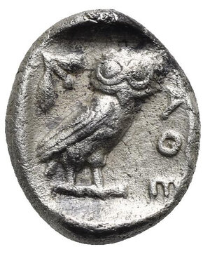 reverse: ATTICA. Athens. Circa 454-404 BC. Drachm (Silver, 13.17 mm, 4.07 g) struck after 449 BC. Head of Athena right, wearing crested Attic helmet, decorated with palmette, and earring. Rev. AΘE vertical to right. Owl with closed wings standing right, head facing; olive branch to left (crescent not visible or absent), all within incuse square. Kroll 10; HGC 4, 1631; SNG Copenhagen 41-3. Unusual oval shape. Good Fine.
From a European collection formed prior to 2005.
