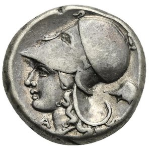reverse: CORINTHIA. Corinth. Circa 350-300 BC. Stater (Silver, 25.00 mm, 8.56 g). Pegasus flying left, Ϙ below. Rev. Helmeted head of Athena left. A below chin, Thessalian helmet to right. Ravel 1040. Pegasi 402. BCD  Corinth 115. Toned. Very Fine.