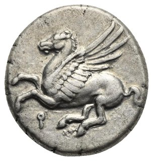 obverse: CORINTHIA. Corinth. Circa 350-300 BC. Stater (Silver, 20.70 mm, 8.54 g). Pegasus flying left, Ϙ below. Rev. Helmeted head of Athena left, wearing Corinthian helmet with laurel; Chimera, A-P flanking neck truncation (not visible). Calciati, I, 262, 428. Ravel 1010. BCD Corinth, 102. Light toned with pleasing iridescent gold. Extremely Fine.